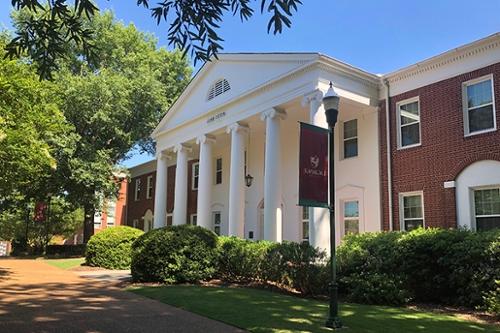 Exterior view of Pitts Residence Hall in summer